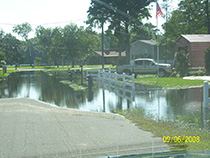 Flooding in Front of Several Houses