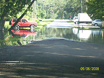 Flooding Over Road in Neighborhood